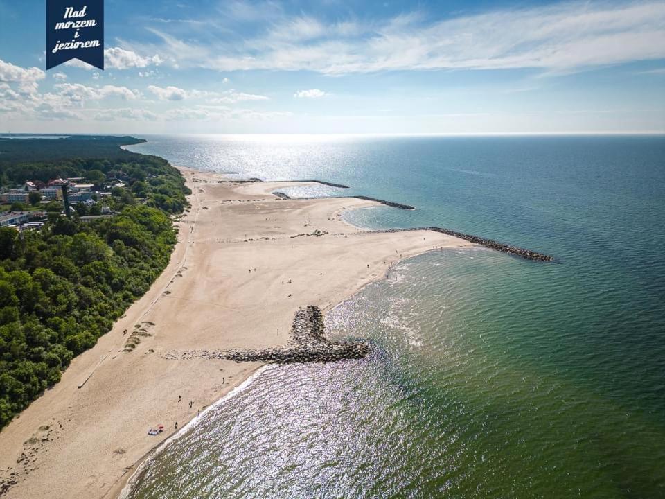 Caloroczne Domki Nad Morzem I Jeziorem Jezierzany Bagian luar foto